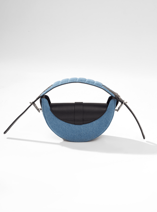 Half Moon Women Handbag with boomerang-shaped elongated top handle design and an adjustable frontal strap in Denim Blue 