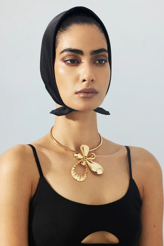 The Scoop Neck Edit: 6 Necklaces That Transform the Look