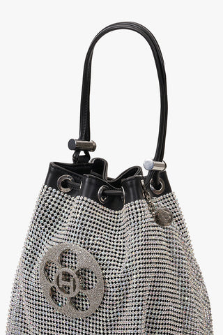 The Crystal Poppi Bucket Bag In Stardust Silver