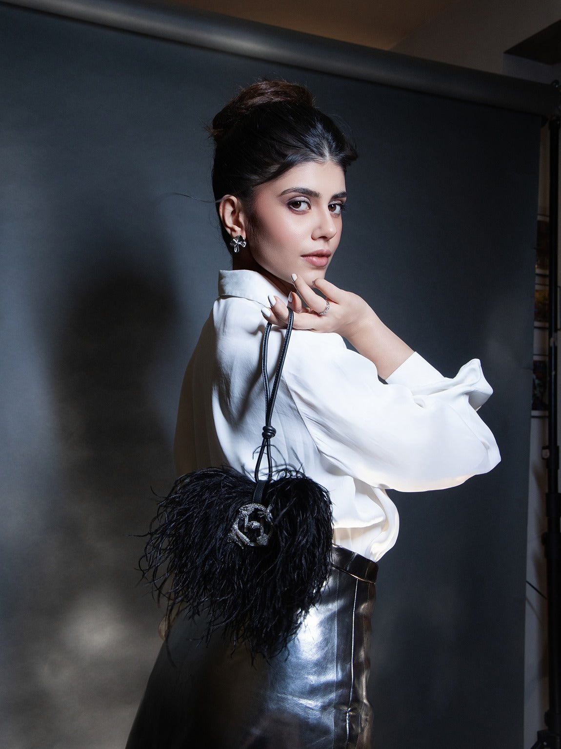 Sanjana Sanghi in The Scarlet Minivet Feather Handbag in Caviar Black