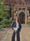 Niki Mehra In Koko Halo Cascade Clutch in Ivory
