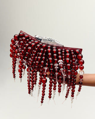 KOKO HALO CASCADE CLUTCH  IN CRIMSON
