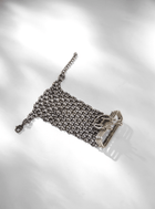Drip "OH" Chainmail Gloves In Rhinestone silver gloves embody a crystal mesh design 