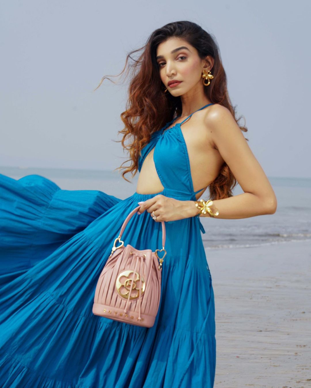 OUTHOUSE JEWELLERY presents The Eclipse Bag In Denim Blue available only at  The Fashion Edit India