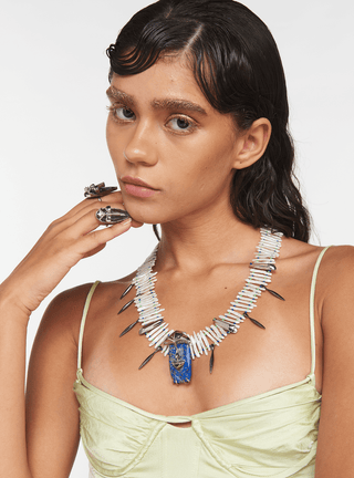 Necklace amalgamated with lustrous keshi pearls and blue lapis stone.