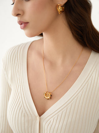 crescent shaped motif pendant necklace