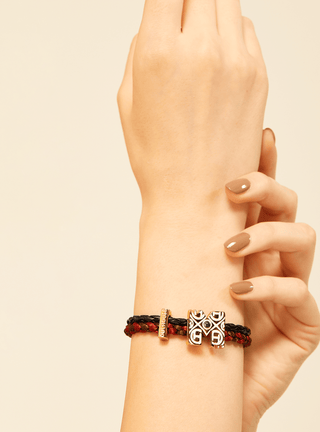 customised women gold bracelets in maroon colour
