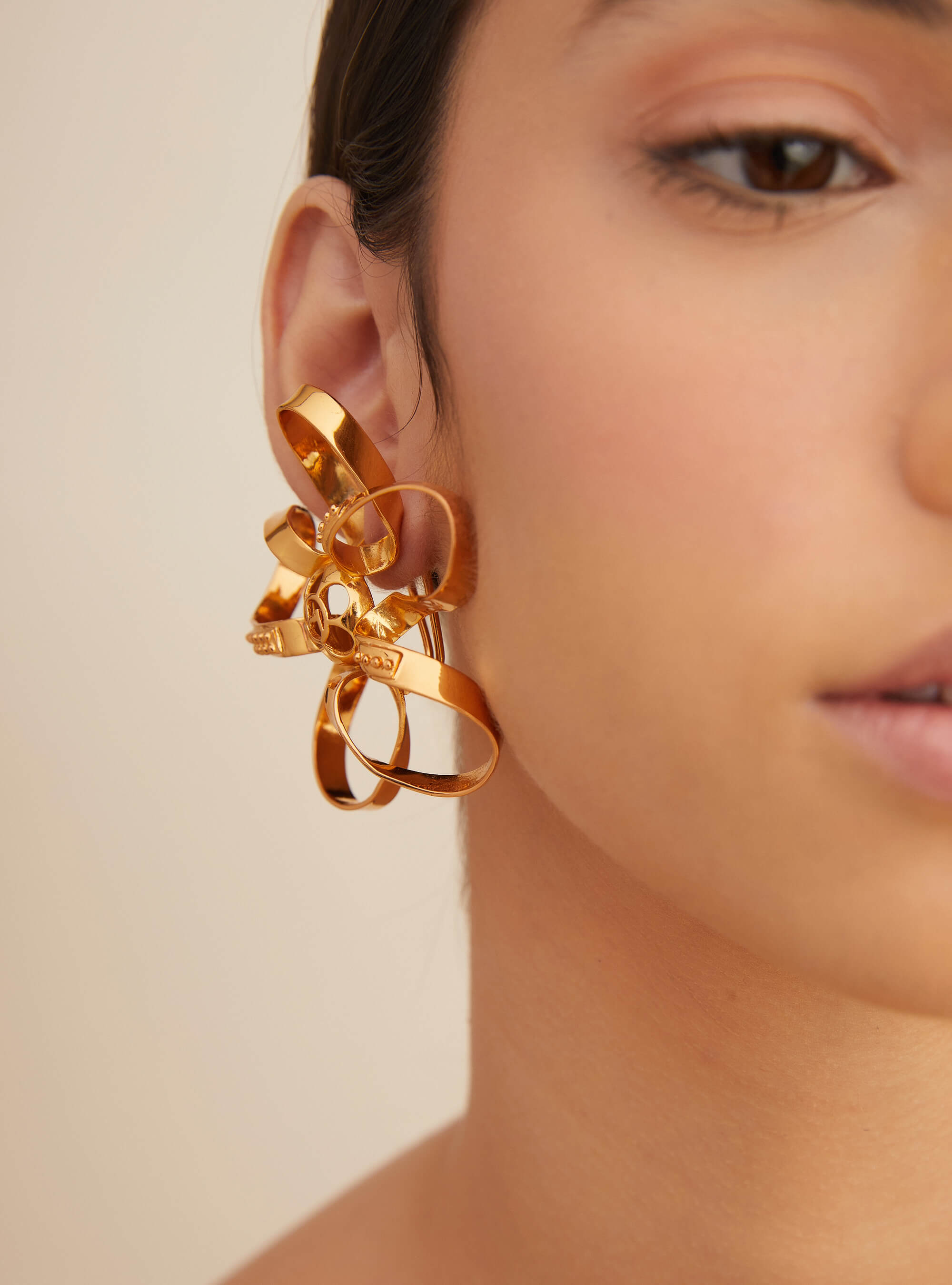 gold stud statement earrings