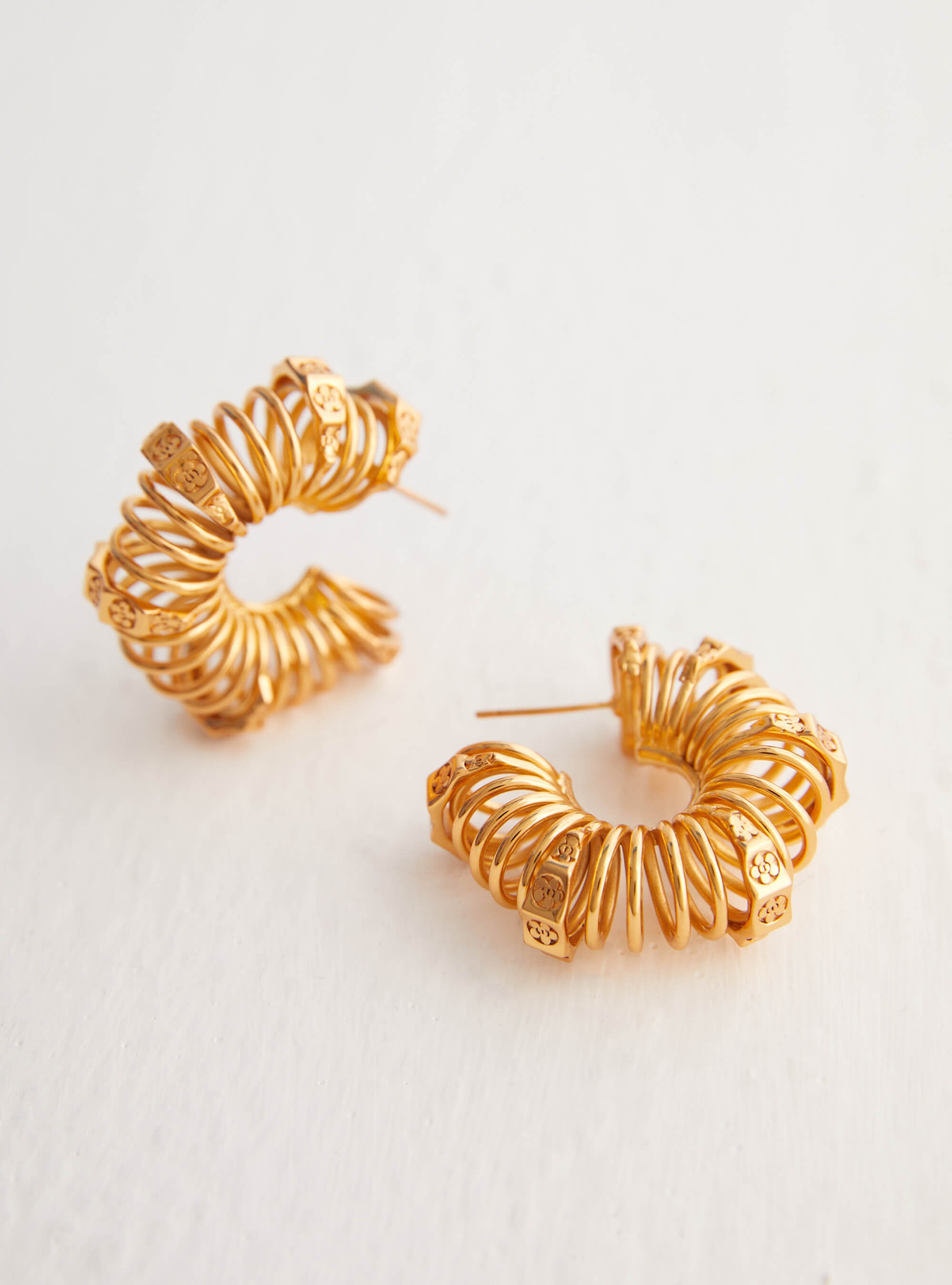 gold spring design hoops